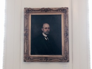 James M. Green, principal of the Normal School, gazes down at his hall.
