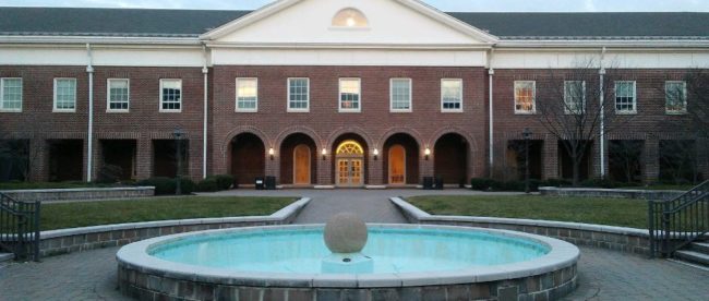 Science Building fountain framed by Science Building in background