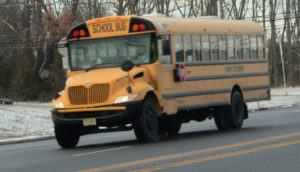 This yellow school bus in a staple in school systems
